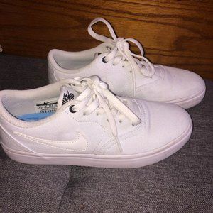 White Nike SBs